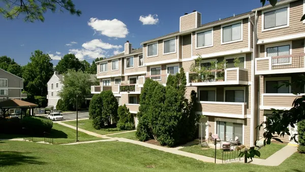 Brown garden-style apartment community