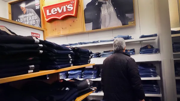 A customer browses Levi's jeans at a store in Chicago on Jan. 29, 2024.