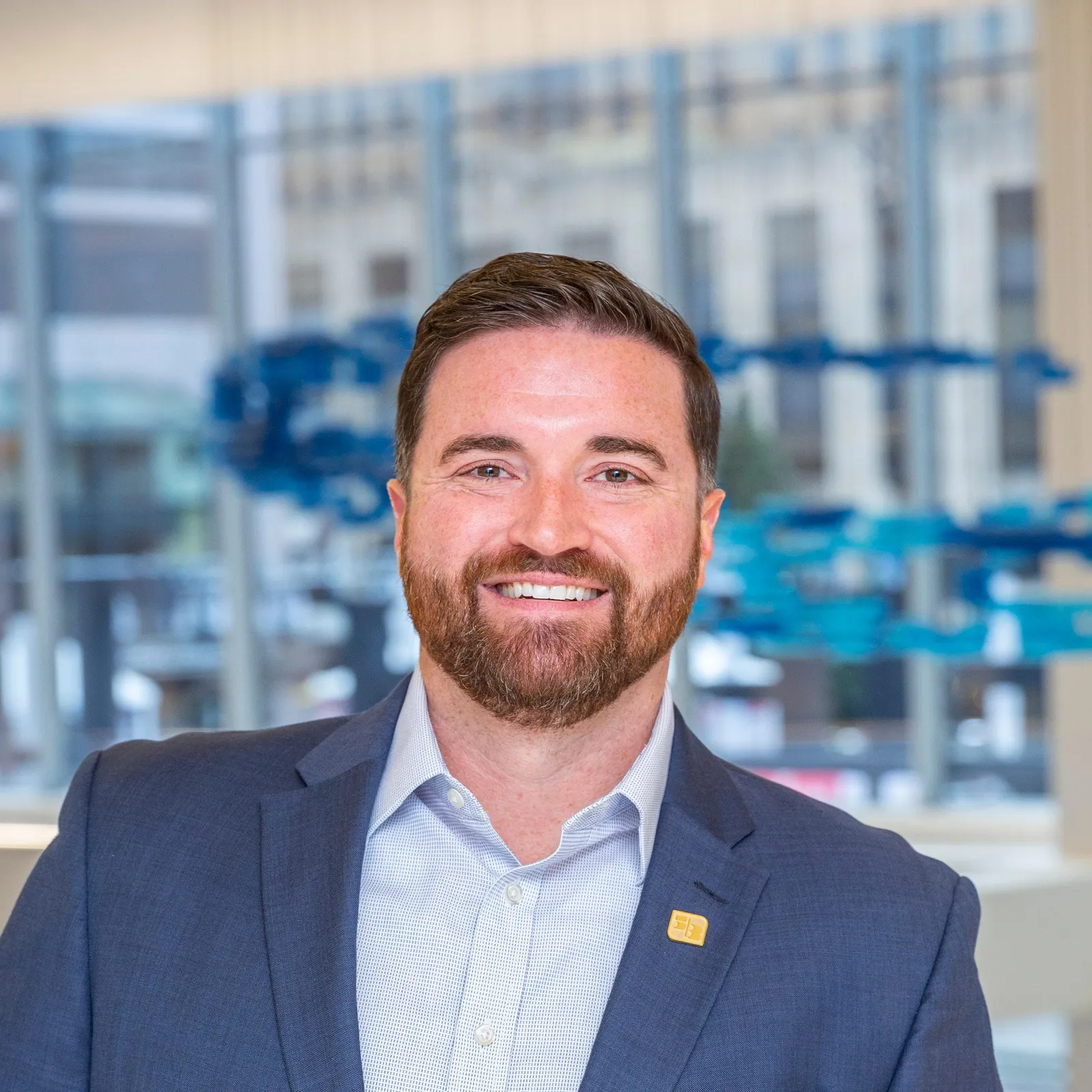 Kristopher Edwards, Fifth Third's head of fraud prevention, poses in a suit