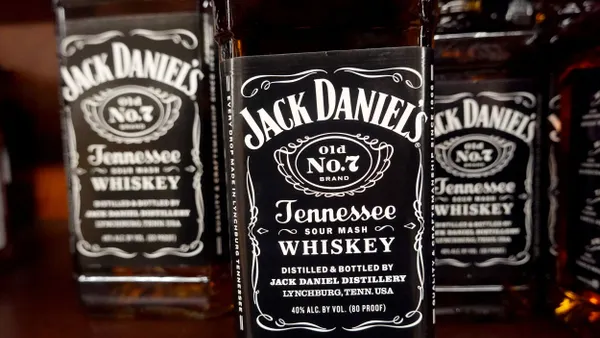 A close up of the labels on Jack Daniel's bottles.