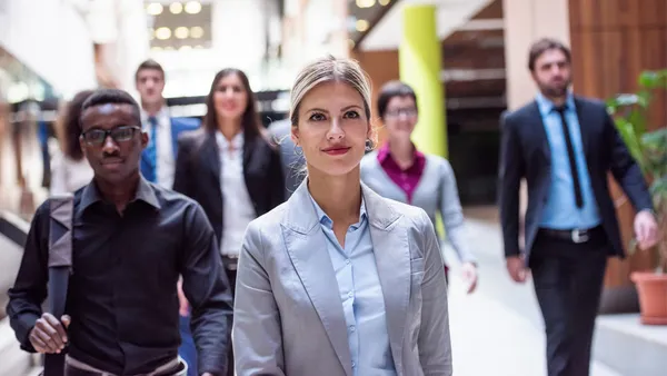 Young professionals staring at the camera