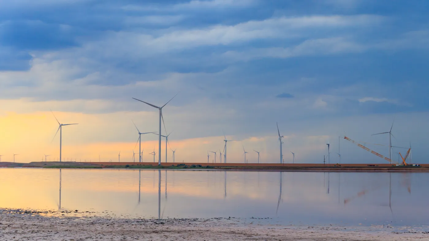 Building and assembling a construction wind turbines farm by a crane