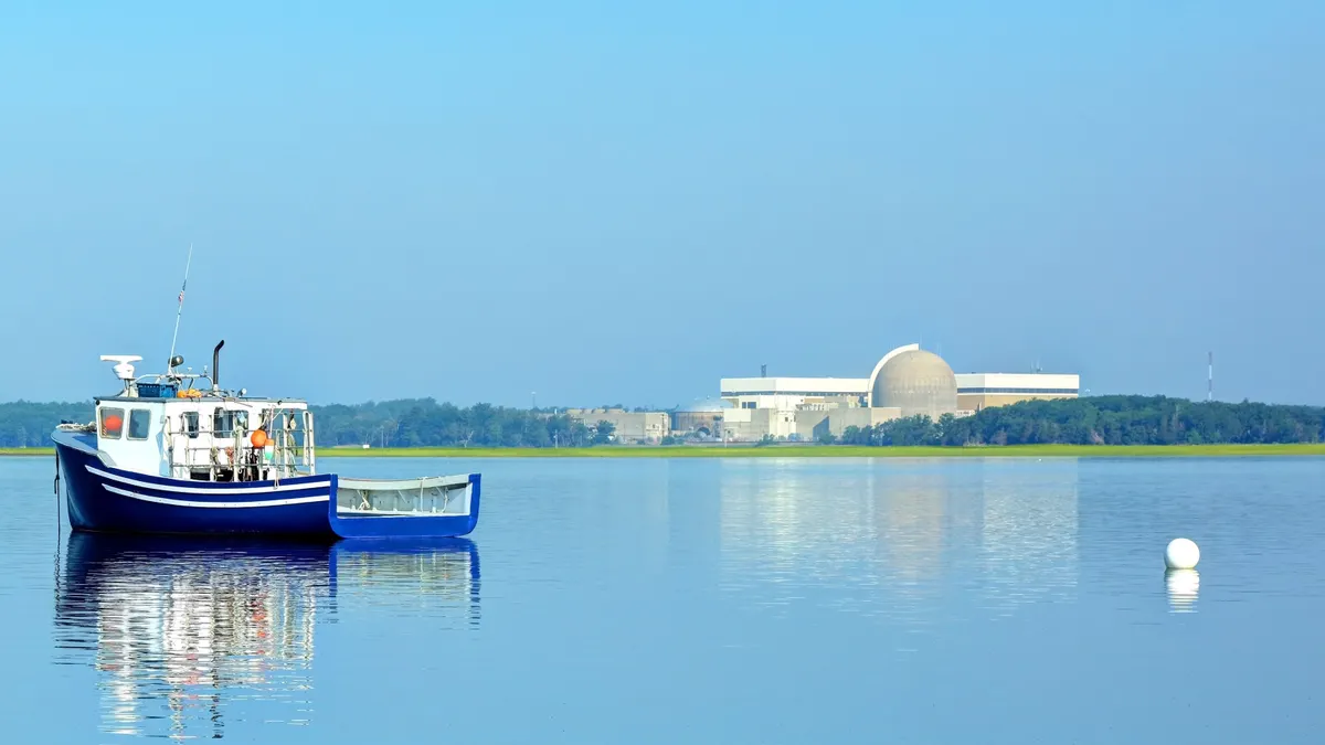 A nuclear power plant sits near the shore.