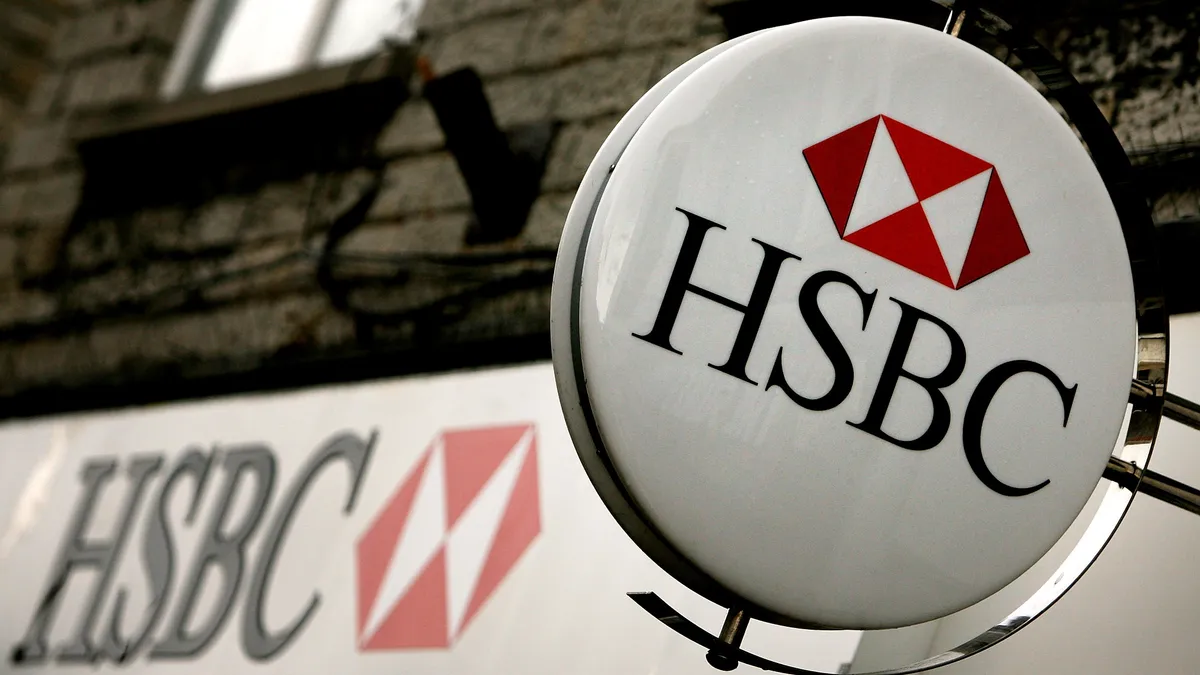 A round sign features HSBC's lettering and logo.