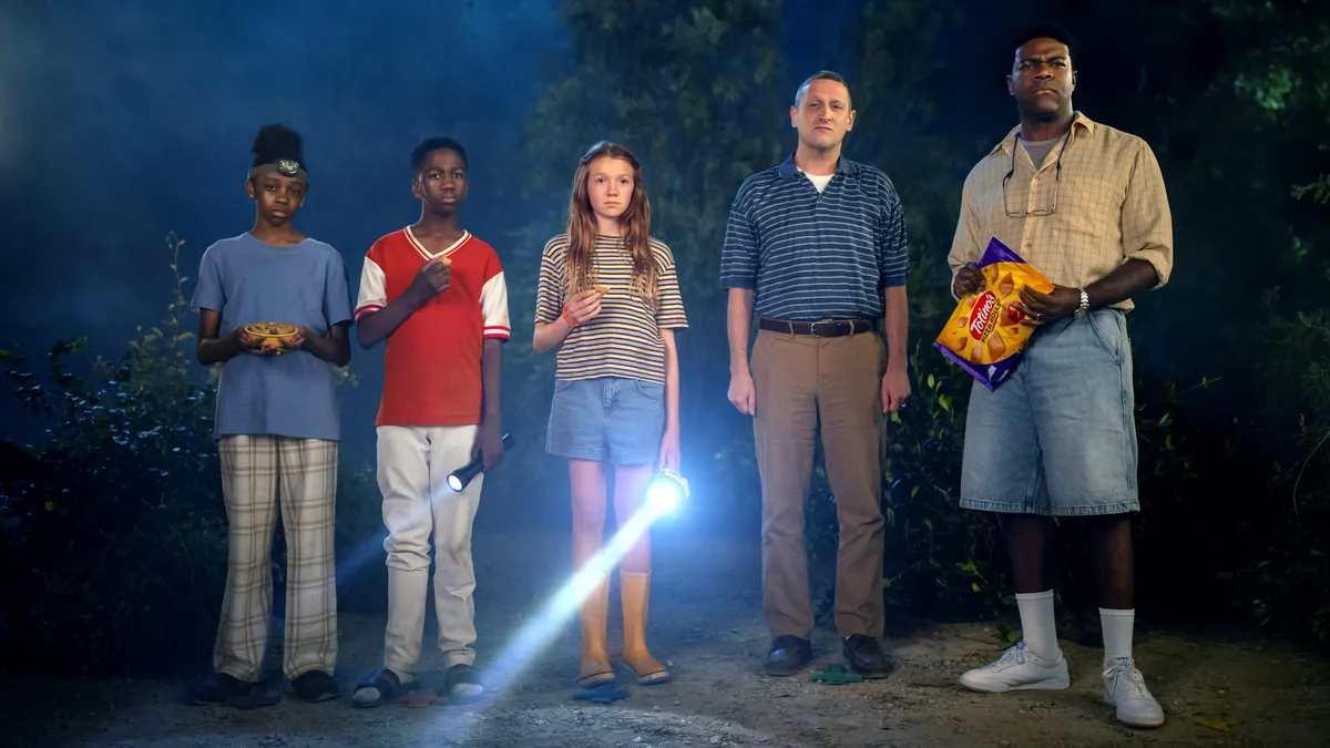 Sam Richardson, Tim Robinson and three teens in a Totino's ad