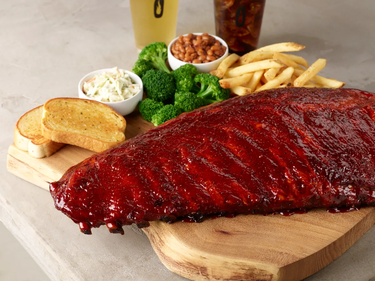 A picture of ribs on a cutting board