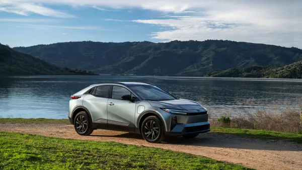 A 2026 Toyota CH-R SE sits on a dirt road near Lake Casitas in California.