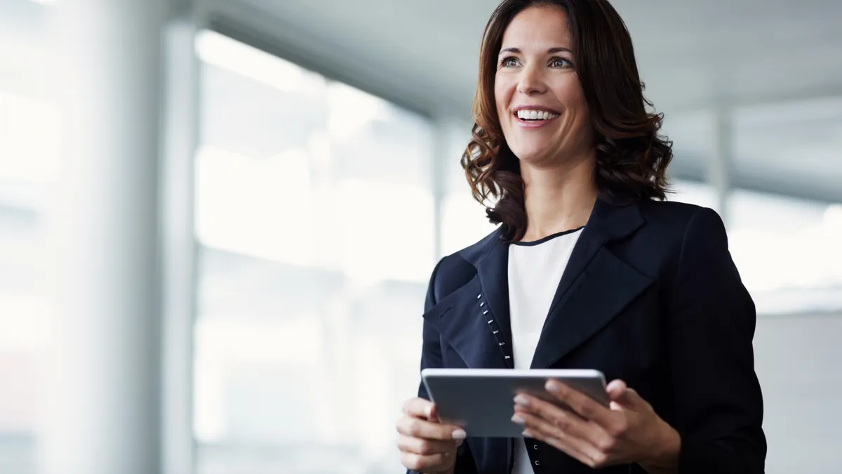 Business woman using a tablet