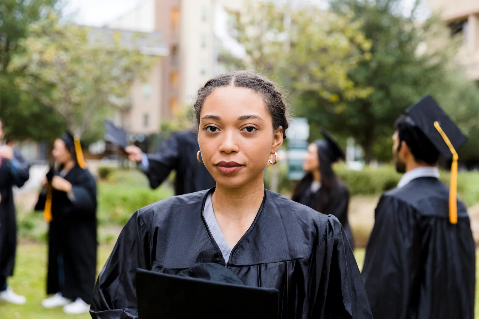 Portrait of a serious person on college graduation day