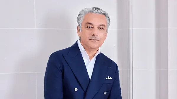 Luca de Meo stands for a professional headshot.