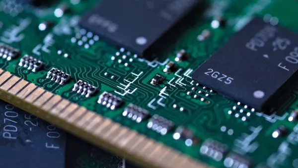 A close up image of a computer RAM memory chip.