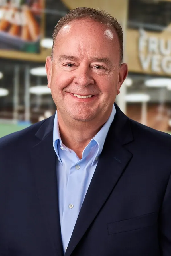 A professional headshot.