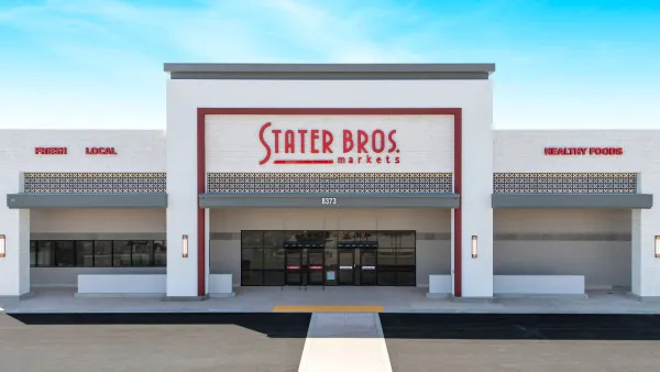 Rendering of a Stater Bros. grocery store exterior. White building with red trim and lettering