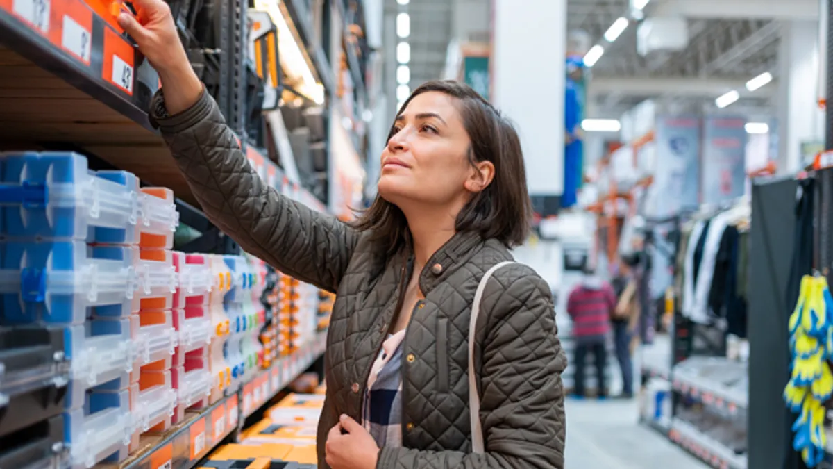 Young adult female grocery shopping