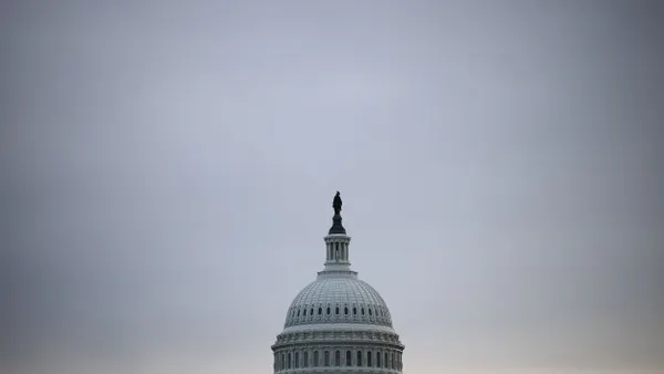 The top of the U.S. Capitol Building's dome is pictured on a cloudy day.