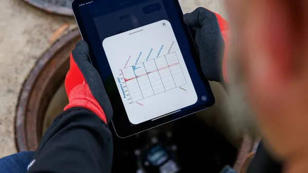 Person holding a tablet