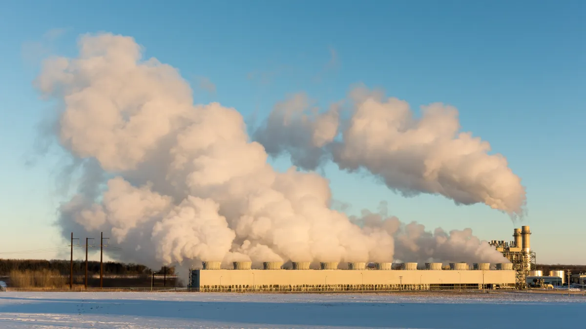 Steam billowing from a gas-fired power plant in the winter.