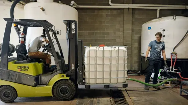 A forklift carries part of Nulife's hydrothermal liquefaction system