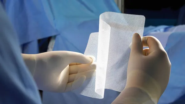 An image of white mesh material.
