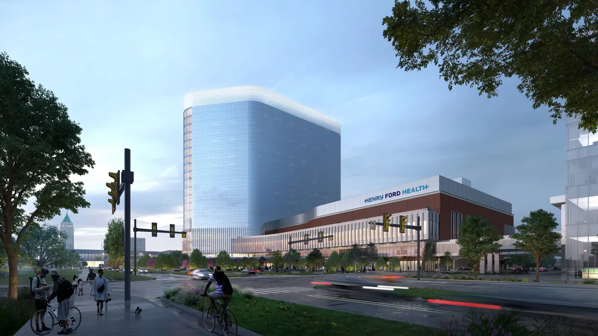 A rendering of a tall, glass-covered building looms in the background under a blue sky.