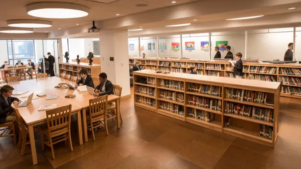 The library in The Buckley School NYC's Walsh Building with students learning.