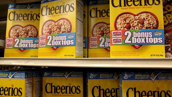 Cheerios boxes on a store shelf