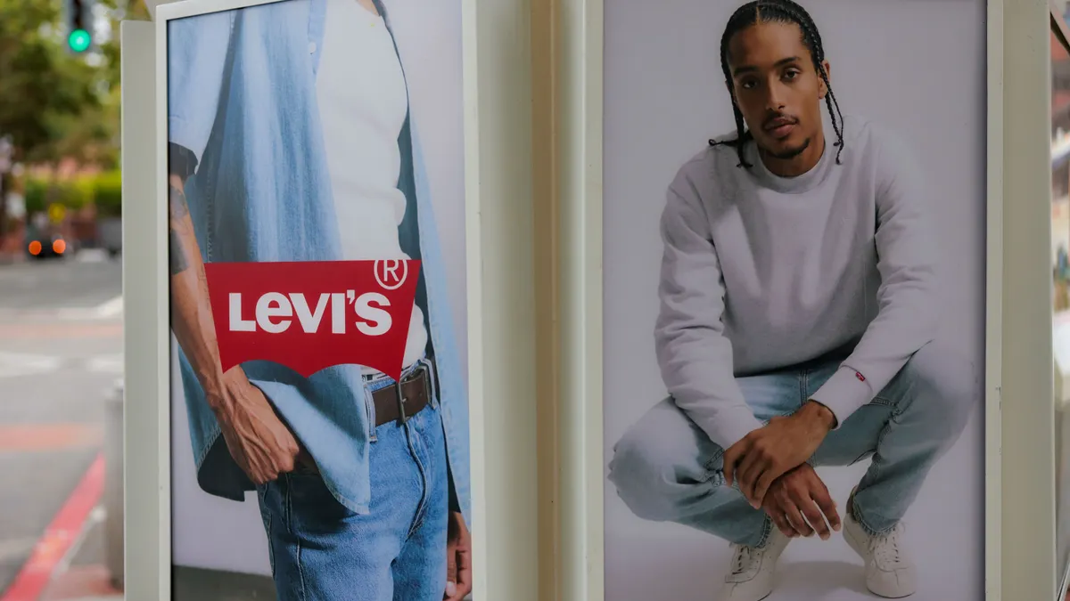 An advertisement depicts two people wear Levi Strauss apparel.