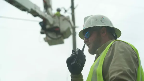 Construction worker wearing work helmet