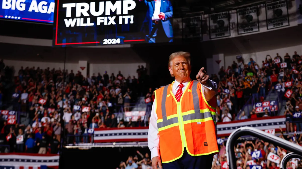 Former President Donald Trump greets supporters during a campaign event on Oct. 30, 2024 in Green Bay, Wisconsin.