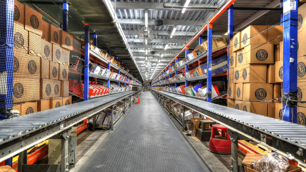 Conveyor belts inside a warehouse and distribution center.