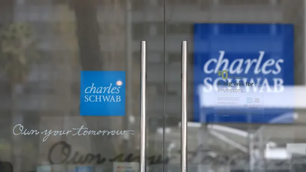 A sign is posted on a door at a Charles Schwab office on April 17, 2023 in San Francisco, California.