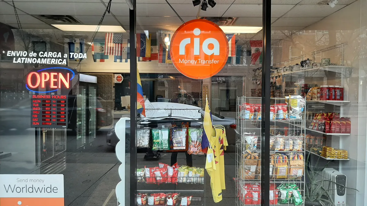 Ria sign in convenience store window