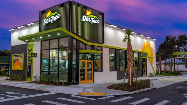 The exterior of a Del Taco during the evening