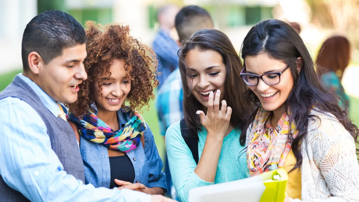 Group of people together discussing topic