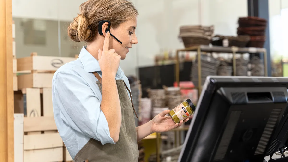 Woman working in a retail or store environment