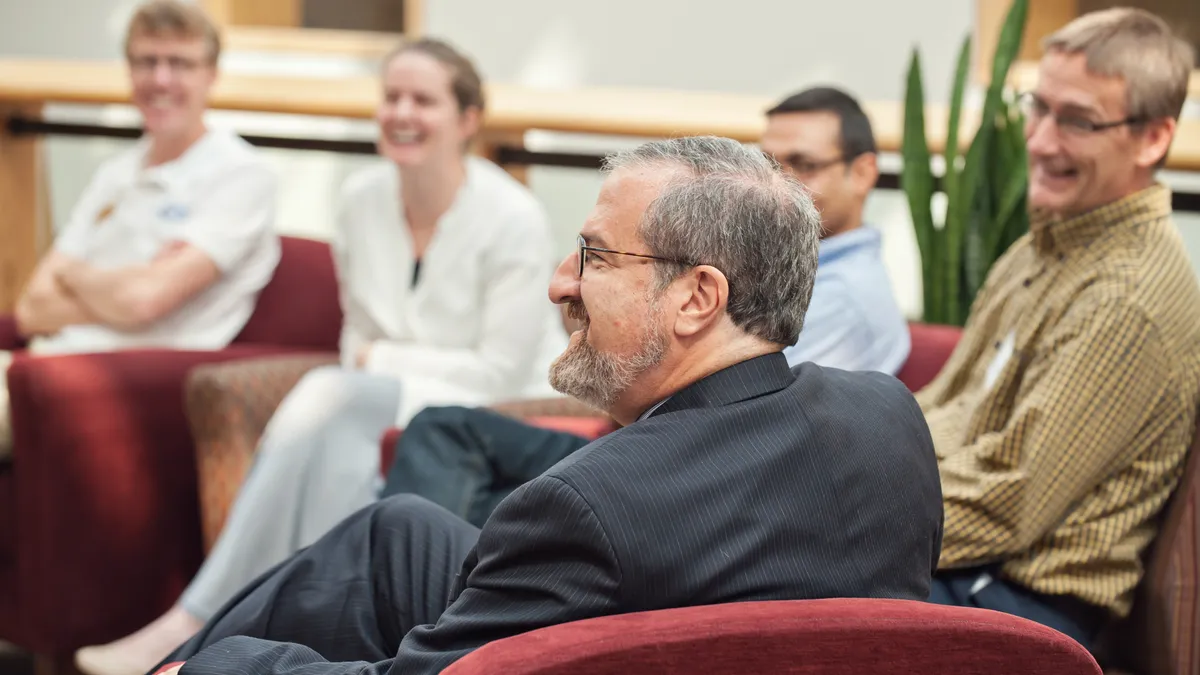 Mark Schlissel meeting with students and faculty at the School of Natural Resources and Environment at the University of Michigan.