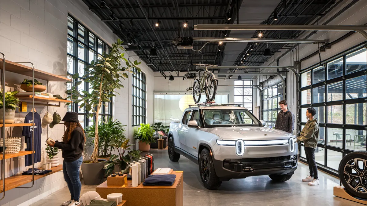 Customers browse products at a Rivian Spaces showroom in Alpharetta, Georgia.