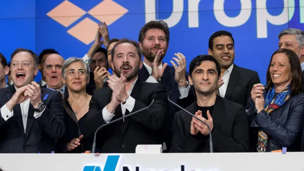 Dropbox executives celebrate the launch of Dropbox's initial public offering.
