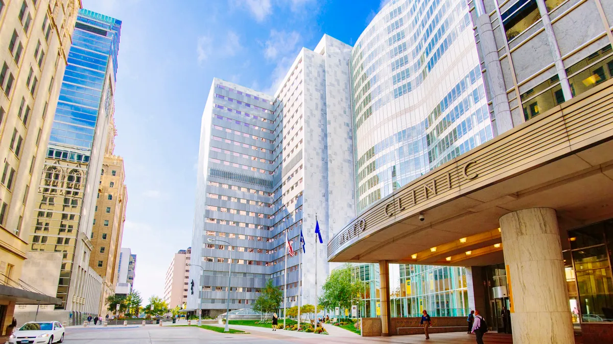 Entrance of a Mayo Clinic health care with buildings in the backgrounds