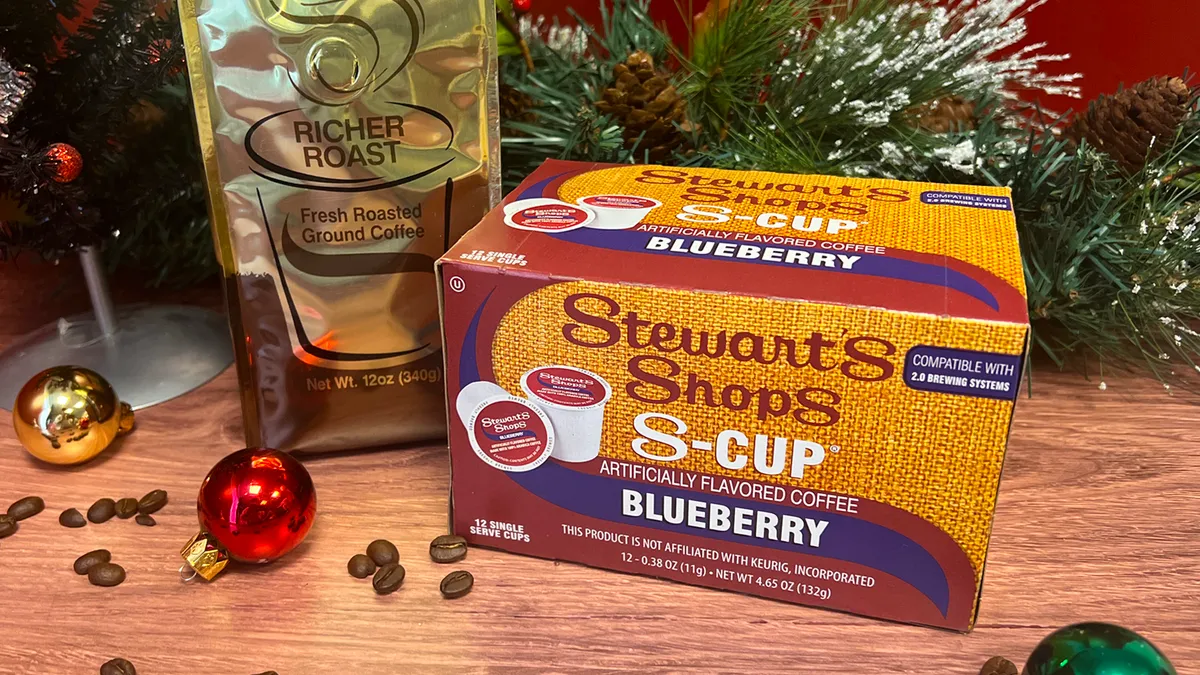 A photo of coffee from Stewart's Shops along with winter holiday decorations.