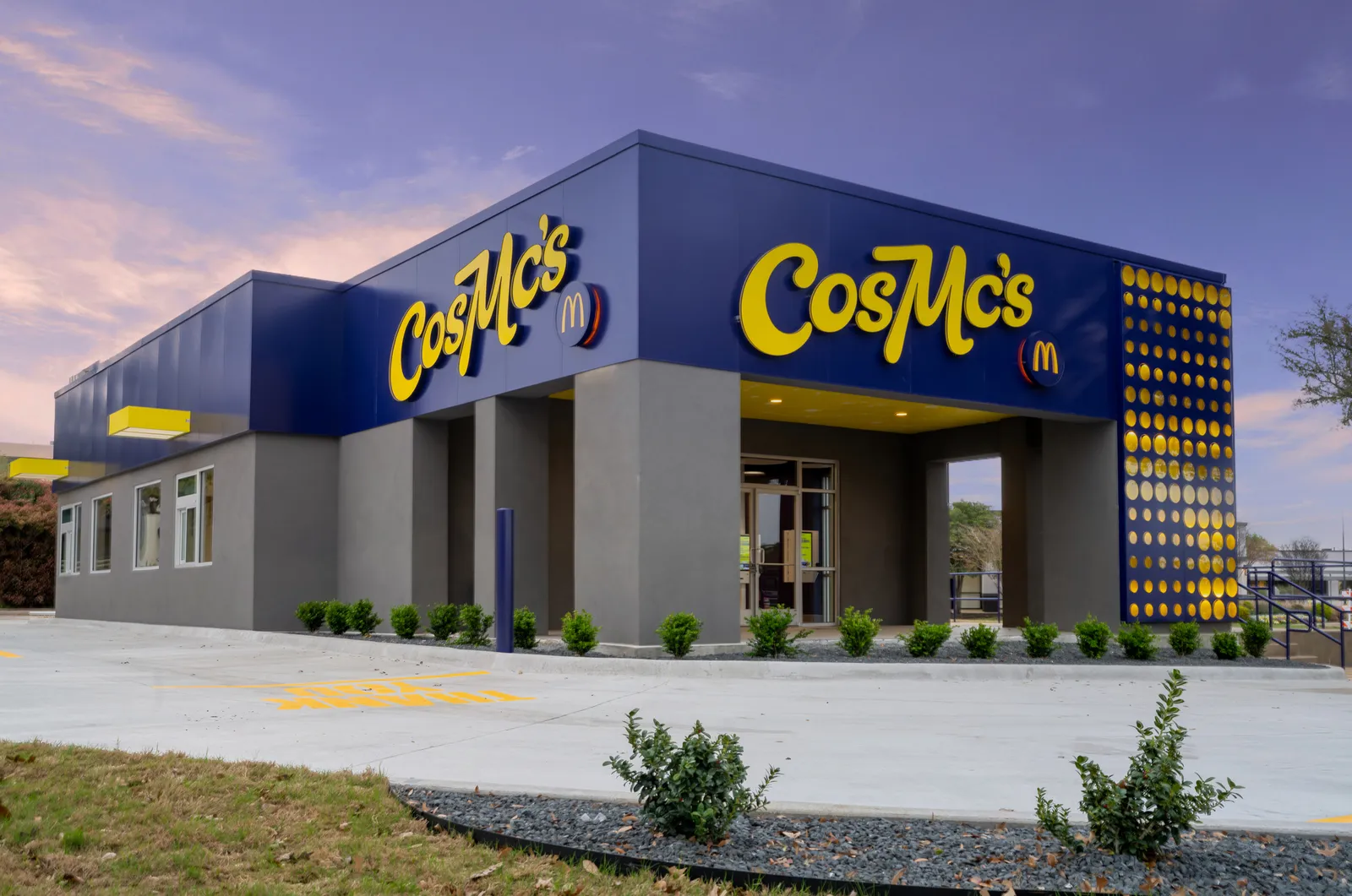 A exterior shot of the blue and yellow building with CosMc&#x27;s signage