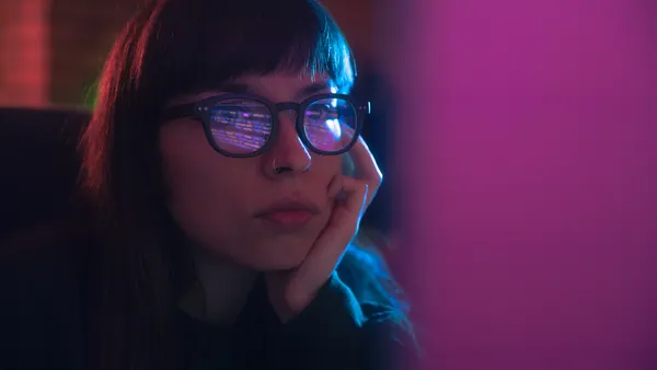 Young woman programmer using computer