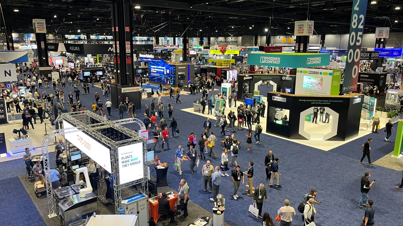 Attendees at Automate 2026 in Chicago walk the South Hall floor filled with vendor booths and robotics demonstrations.