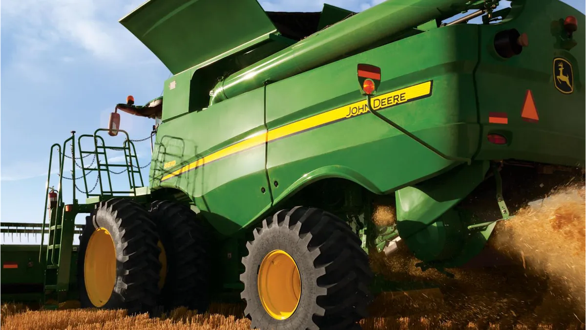 Bridgestone agricultural tires on a tractor.