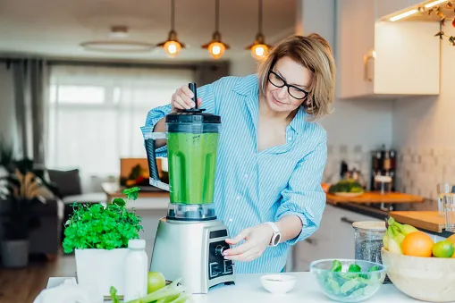 Person making a smoothie