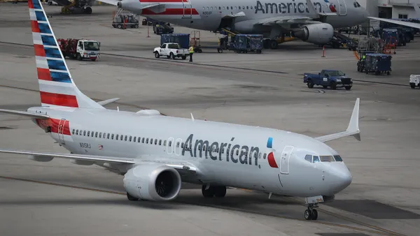 An American Airlines Boeing 737 Max 8 taxiing at the airport.