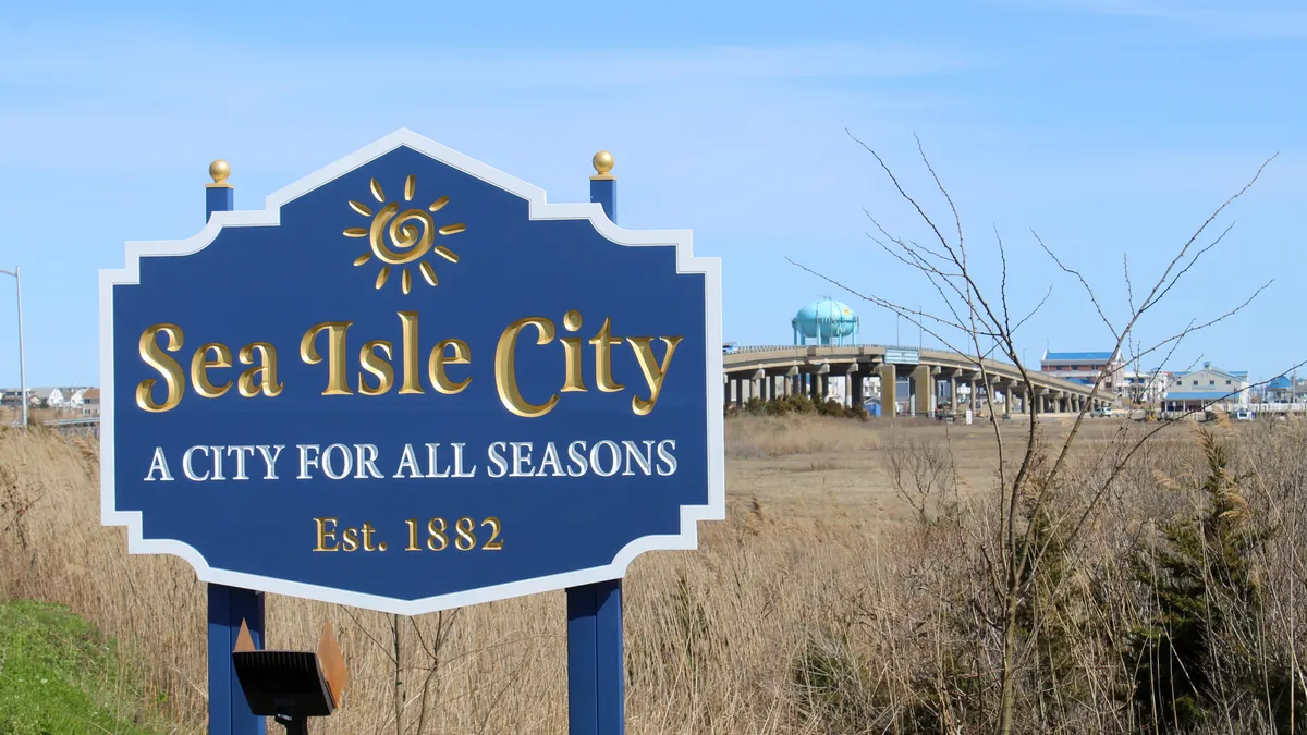 A sign reading "Sea Isle City A City for All Seasons Est. 1882"