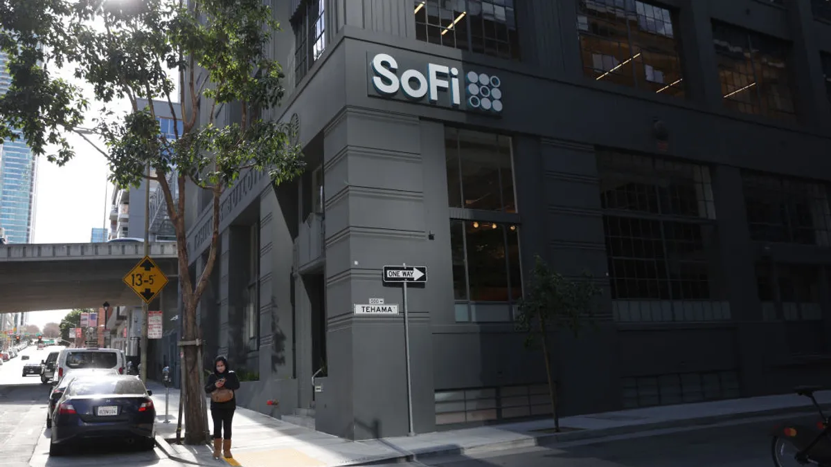 person standing outside of sofi technologies headquarters