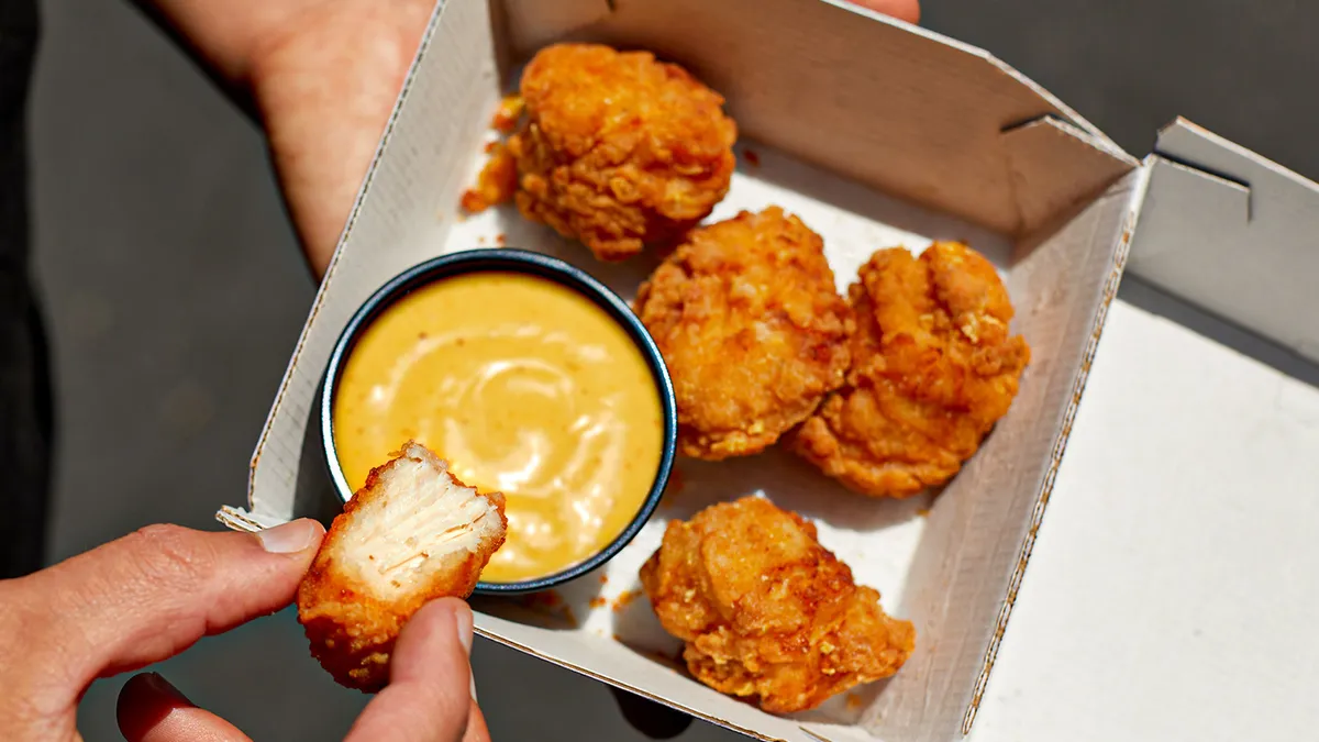 A promotional image for Taco Bell's chicken nugget LTO.