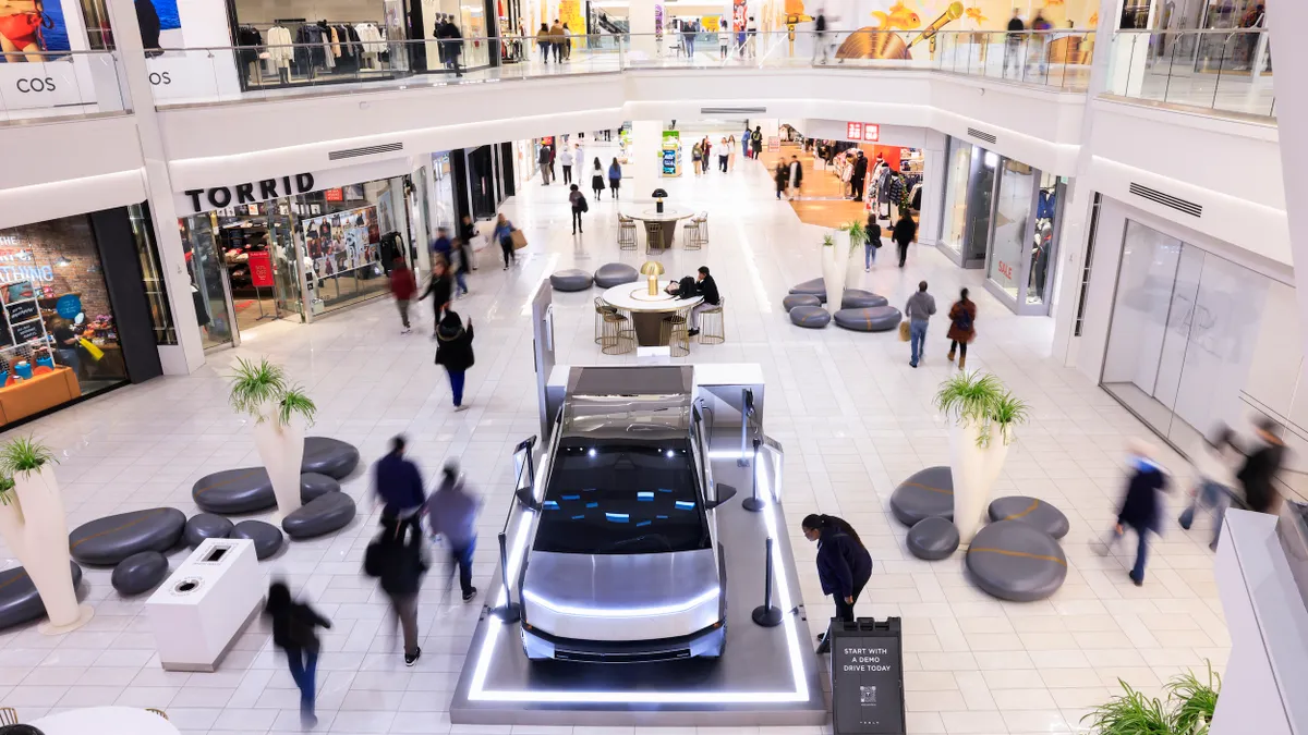 A Tesla Cybertruck is displayed as people visit the American Dream Mall During Black Friday sells on November 29, 2024 in East Rutherford City.